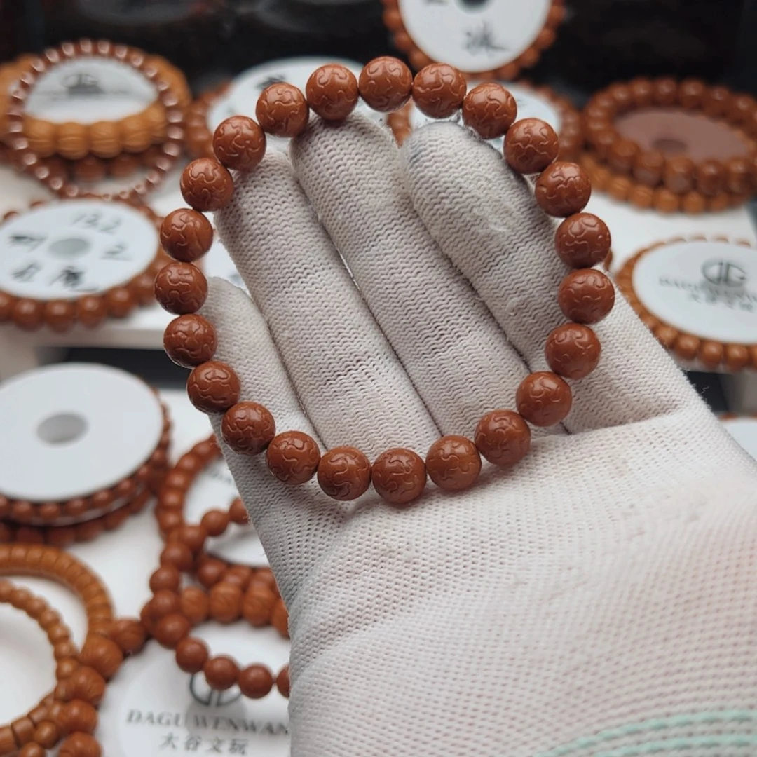 米***严吊坠桃核桃核手串