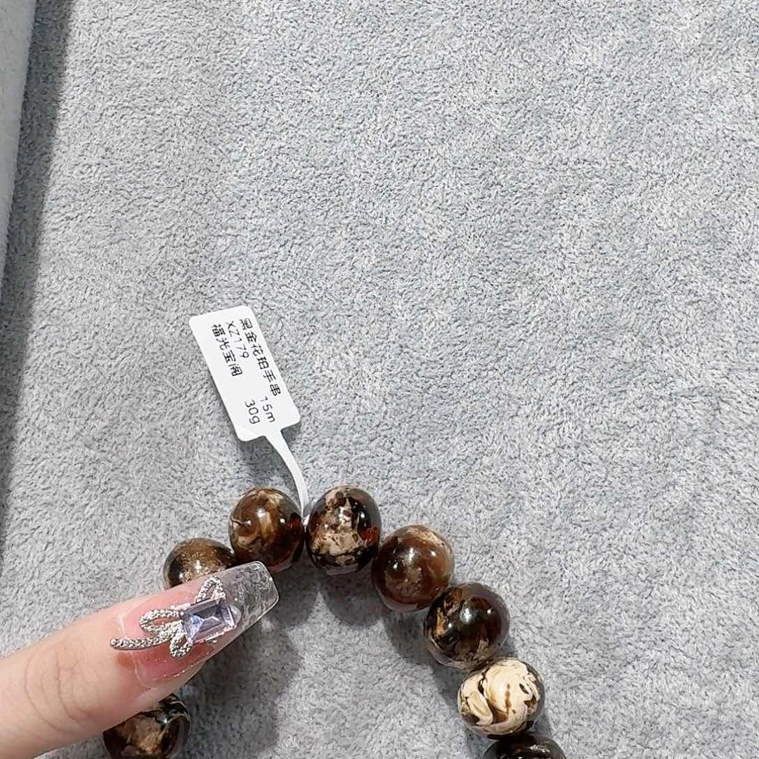 斐***姑手链琥珀未镶嵌抚顺琥珀 黑金干白 15m