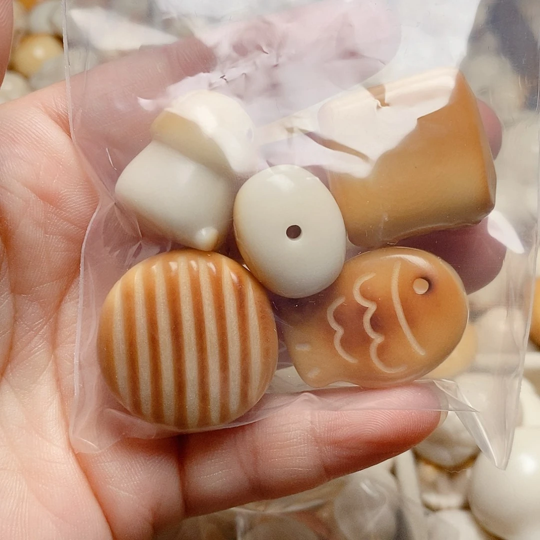 谁***呢菩提根/象牙果吊坠全品四颗，瑕疵一颗