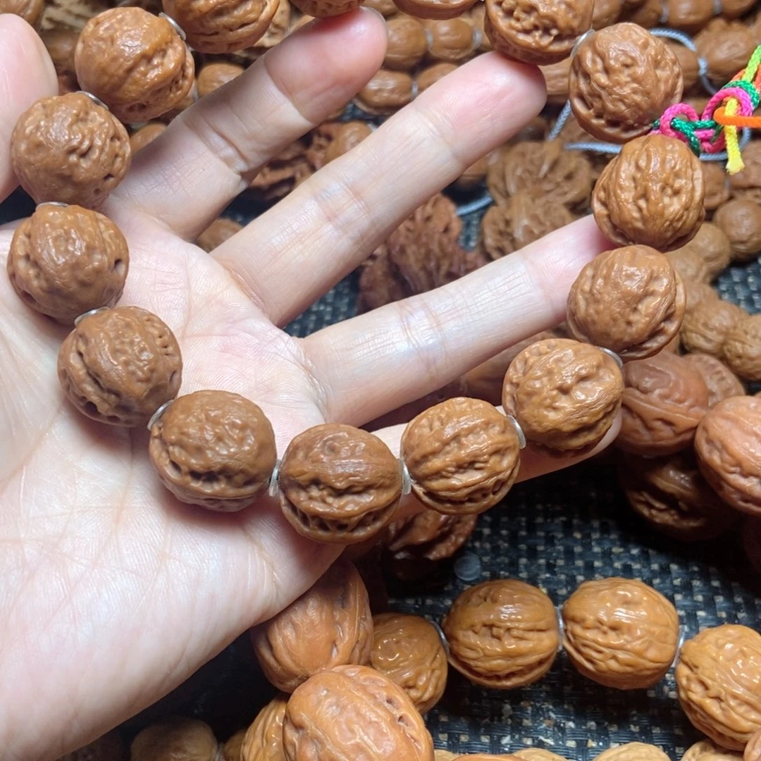 爱***打手串文玩核桃小金豆子