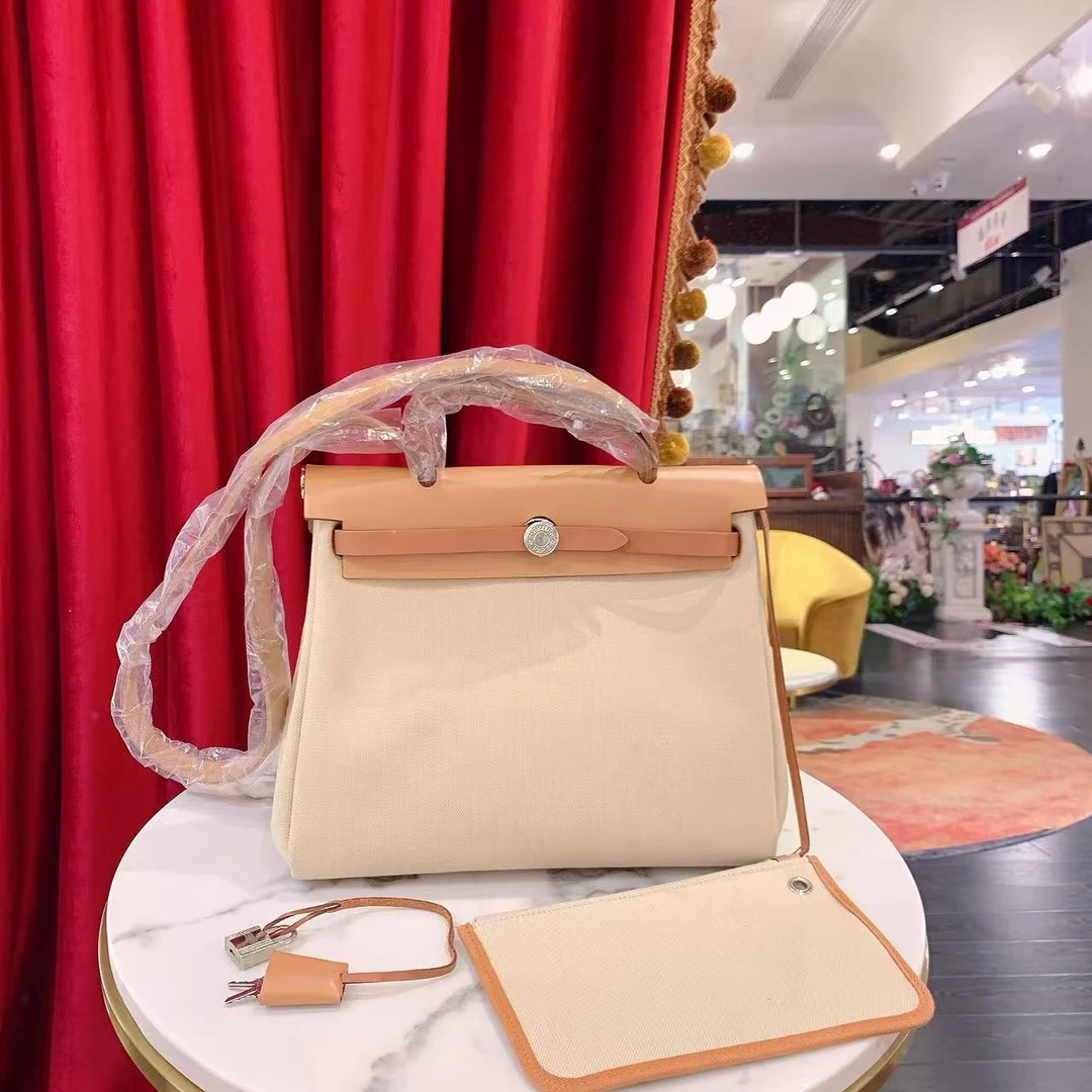95新 Hermes/爱马仕 herbag31水泥灰银扣帆布拼皮单肩包/10612114