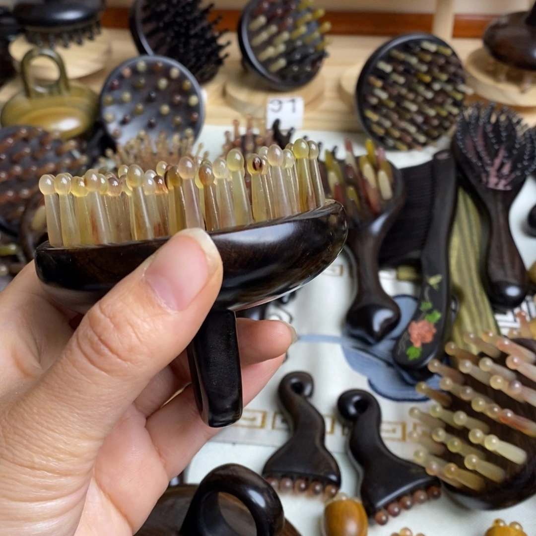 豆***瑕疵紫光檀按摩梳子梳理