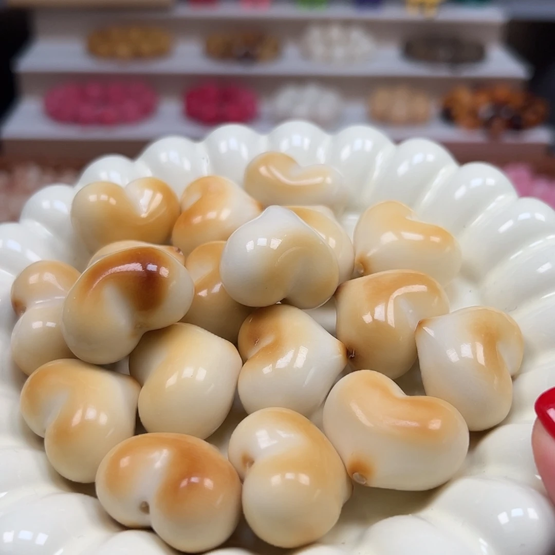 手串菩提根/象牙果瑕疵炭烤皮桃爱心4颗