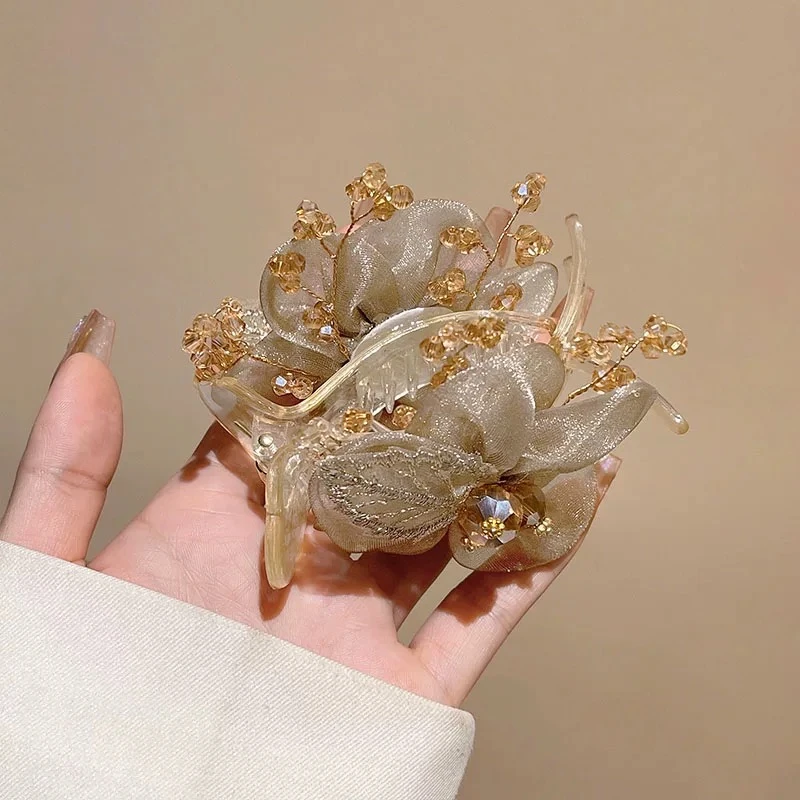 新款精致花朵头饰盘发抓夹女丸子头发卡成人高端头花发夹2532