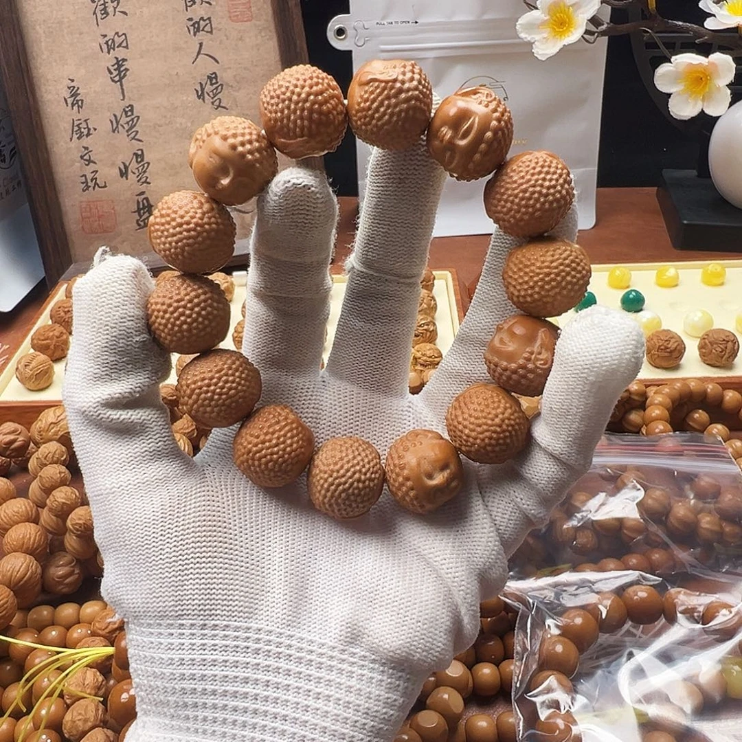 岳****文玩核桃手串猴头