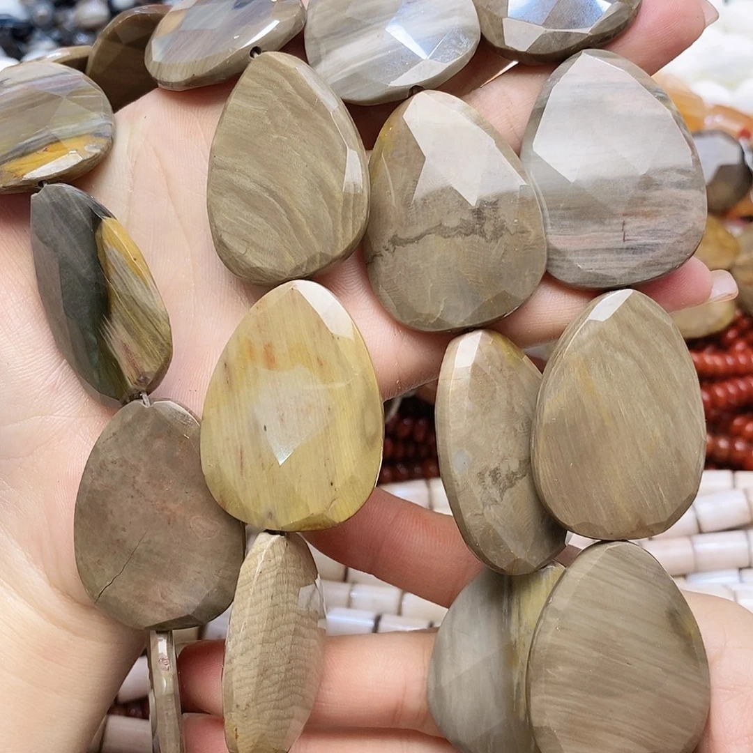 玛瑙/玉髓未镶嵌珠宝半成品木化石一条装