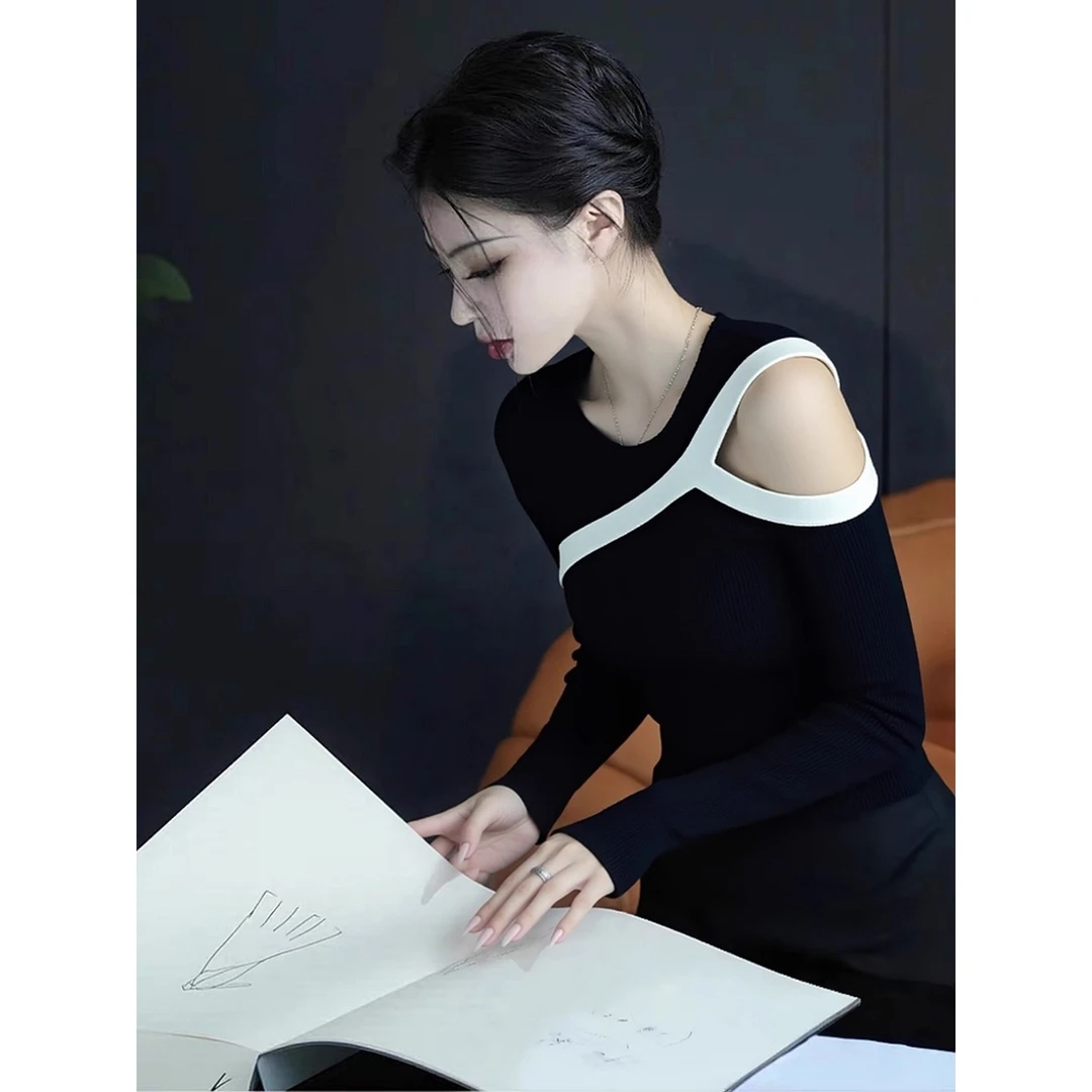 减龄高端欧货洋气小众不撞衫上衣独特别致黑色拼接露肩针织衫女秋