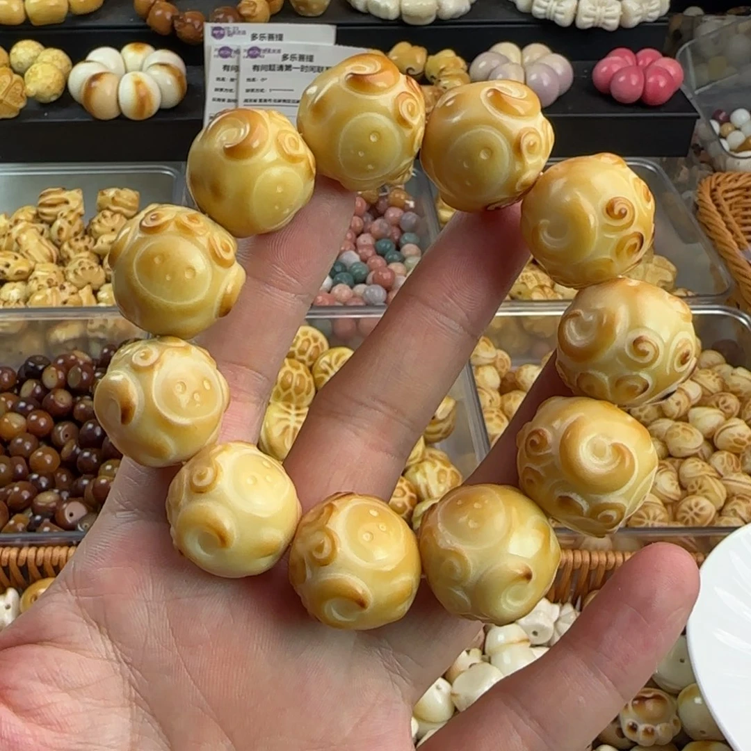吊坠菩提根/象牙果全品炭烤羊头手串一条