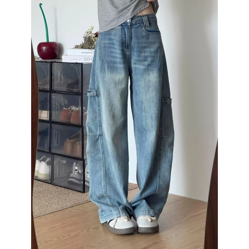 美式设计感拼接水洗弯刀牛仔裤女冬季显瘦百搭磨白宽松阔腿长裤子