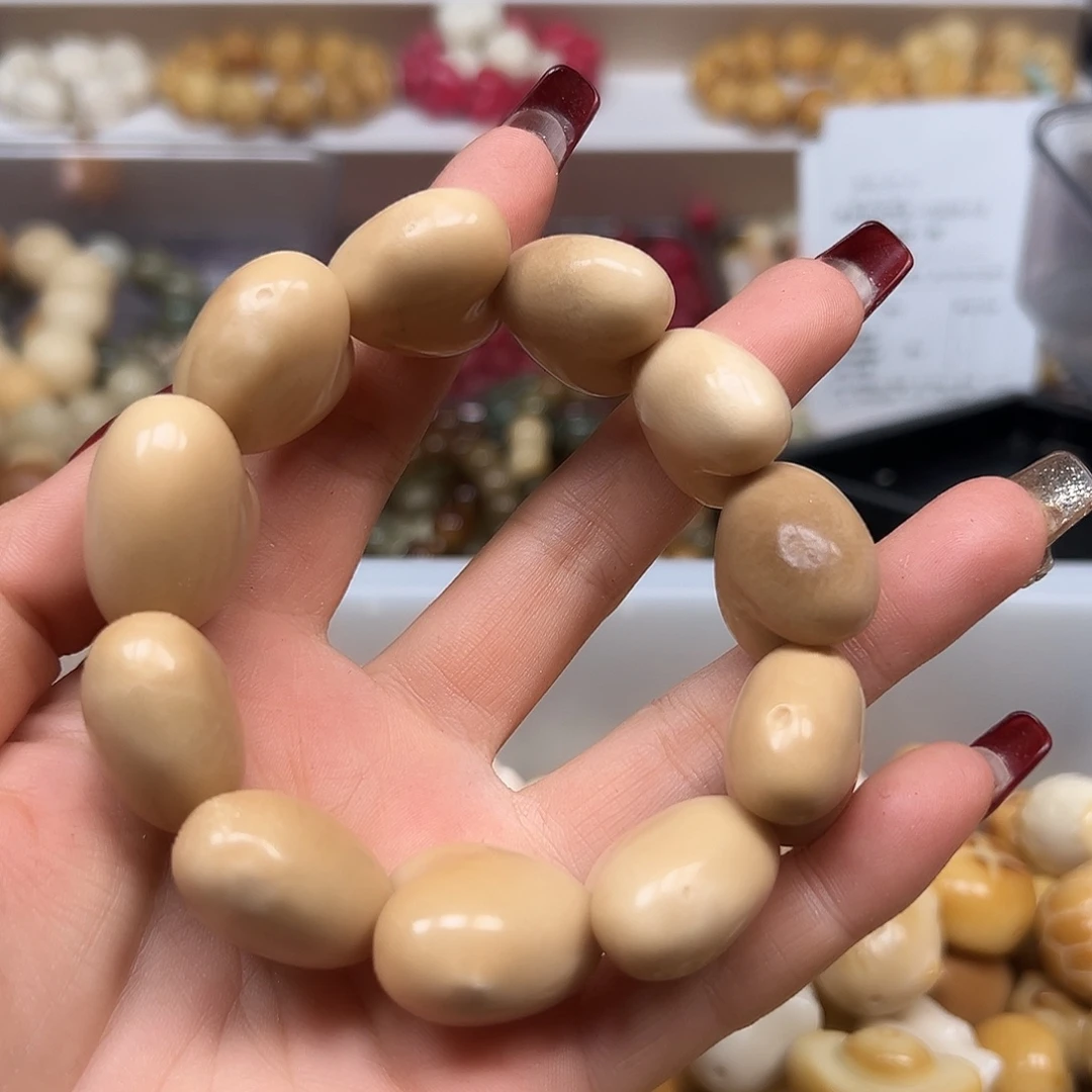 手串菩提根/象牙果瑕疵茶色爱11颗1条表面有裂有眼