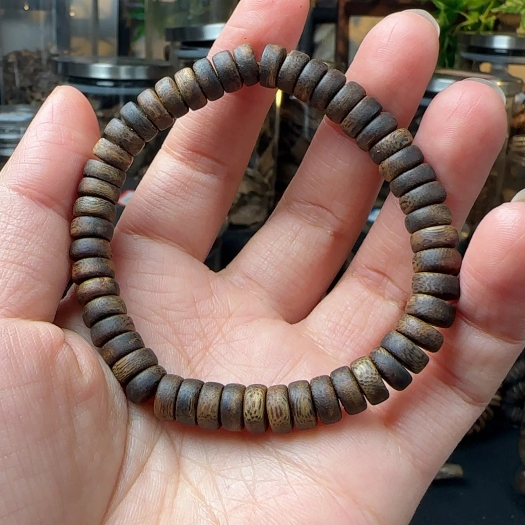 沉香沉香碎屑奇楠淳化老料如意算盘卡0.8