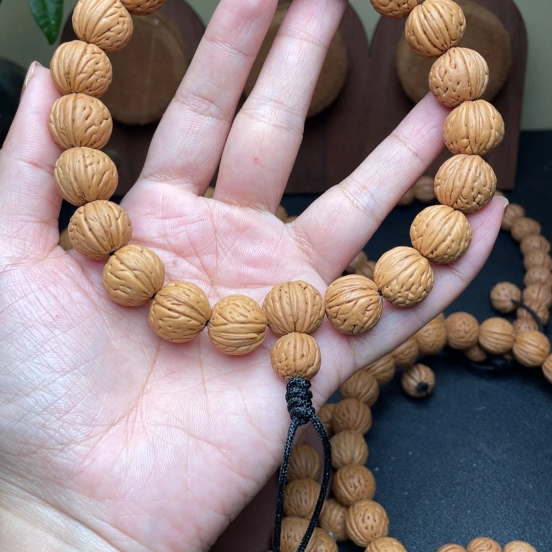 卖****15野生灯笼桃核手持