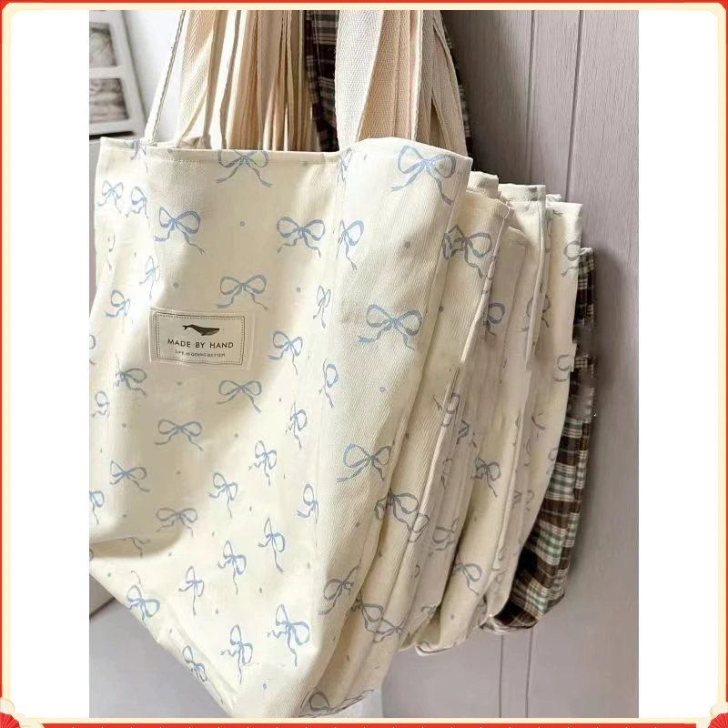 ins春夏季韩风蝴蝶结帆布包学生复古大容量游玩度假手提袋单肩包H