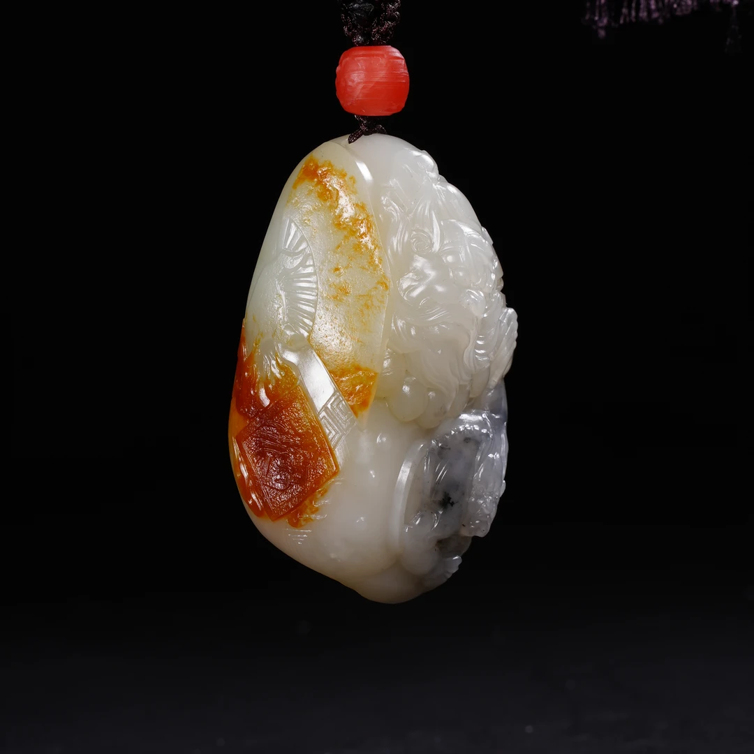 lot40新疆和田玉籽儿钟馗伏魔把件/保利拍卖