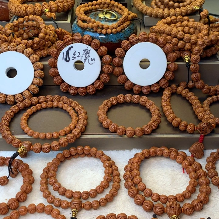 信***己桃核手串秦岭龙纹