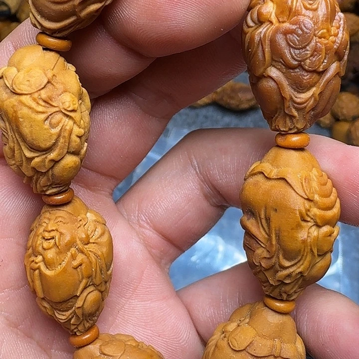 橄榄核手串爱*你的手机