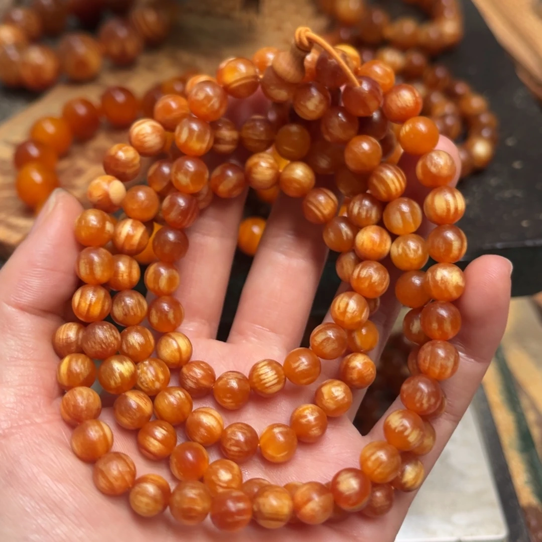 蕾***^手串/手链松木（琥珀木）0.8规格108颗红一点