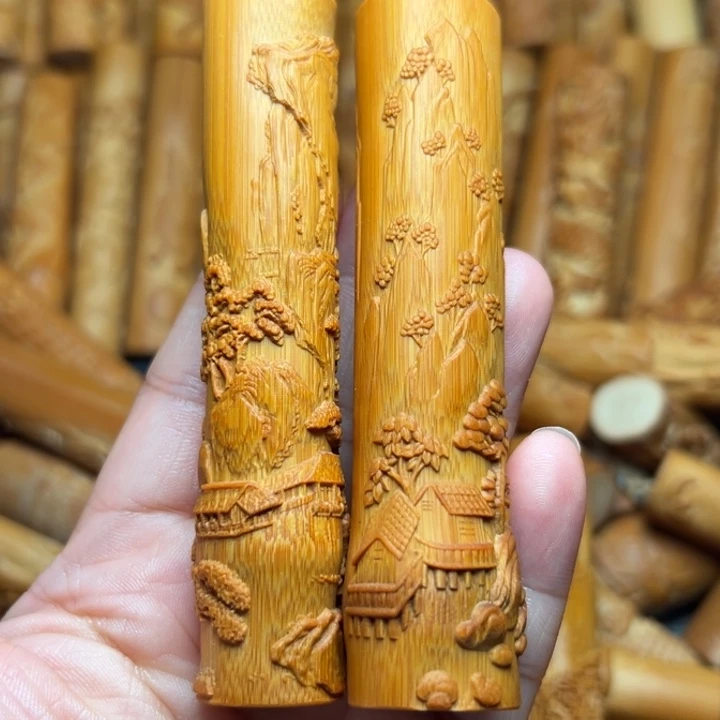 塞***黑实心竹雕刻手把件