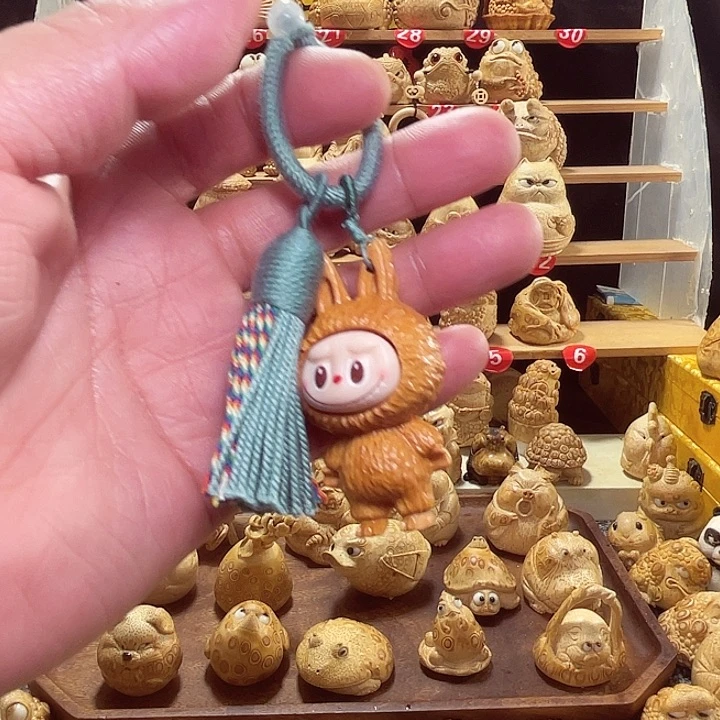 南***墙竹竹根雕拉布布手把件