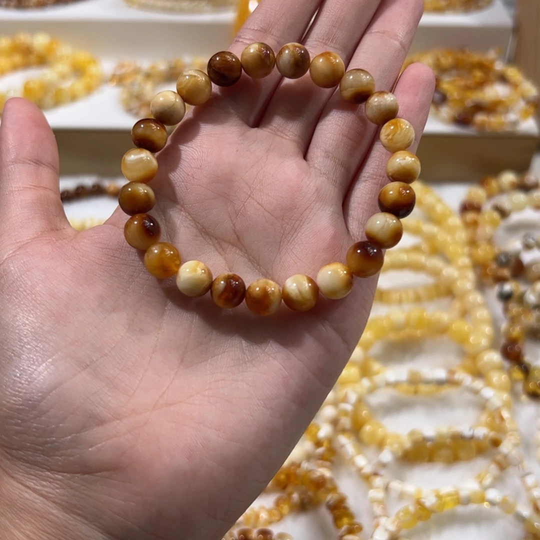 琥珀未镶嵌珠宝奇石浓蜡沁色妖花圆珠手串