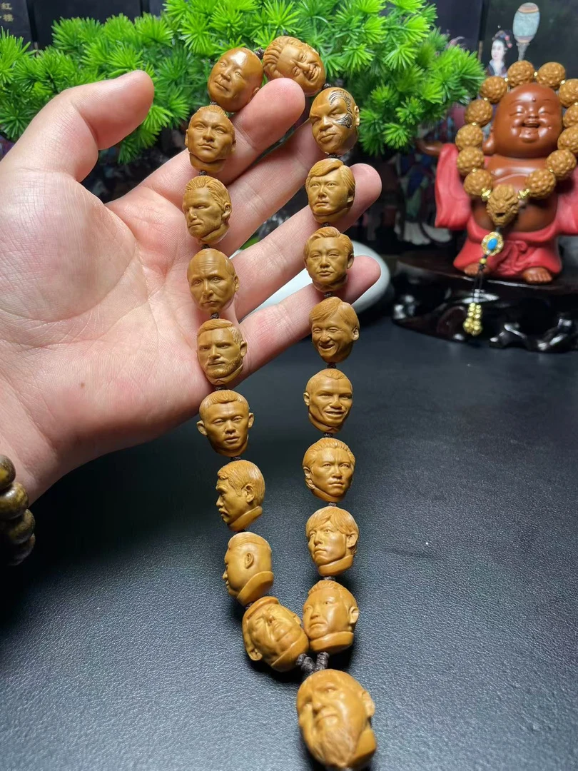 橄榄核雕刻全明星