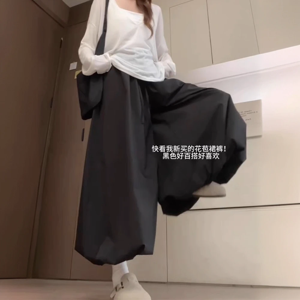 慵懒风黑色花苞裙裤女夏季薄款松紧腰遮胯宽松显瘦休闲九分阔腿裤