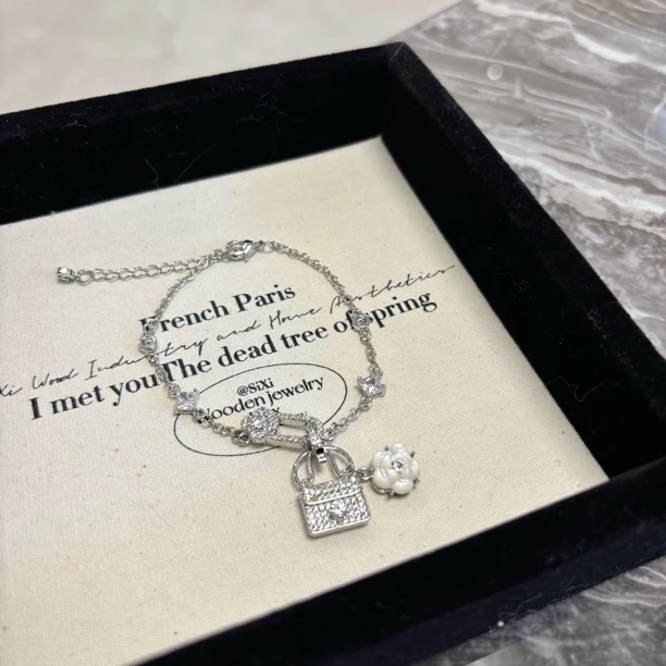 铜合金合成锆石手链 花花包包手链SL2143