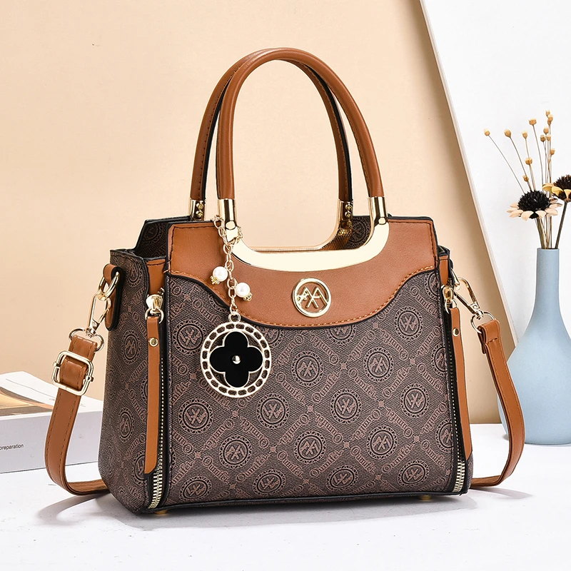 Oumifei/欧米妃（底长25cm宽11cm高19cm）新款大气中年女士包包