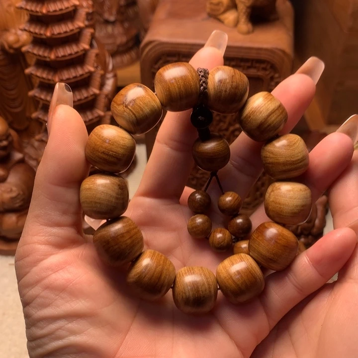 檀香木其他老山檀香手把件瑕疵