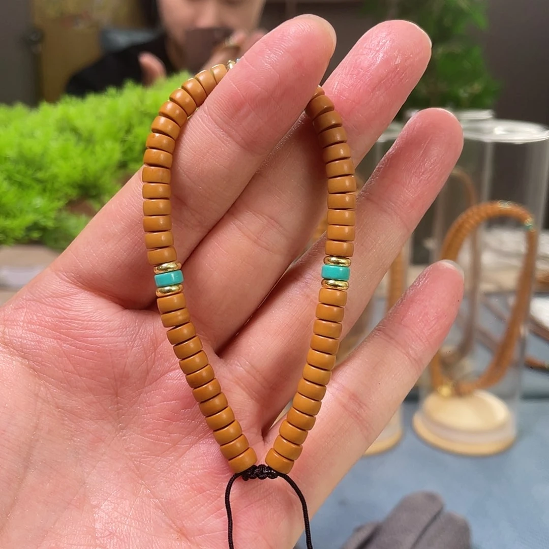 橄榄核手串6.0清水橄榄核尖手持