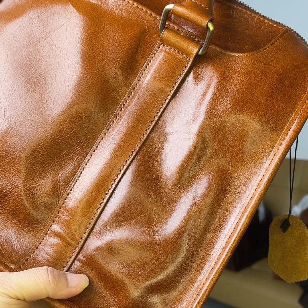 H***u水牛剖层皮革电脑包