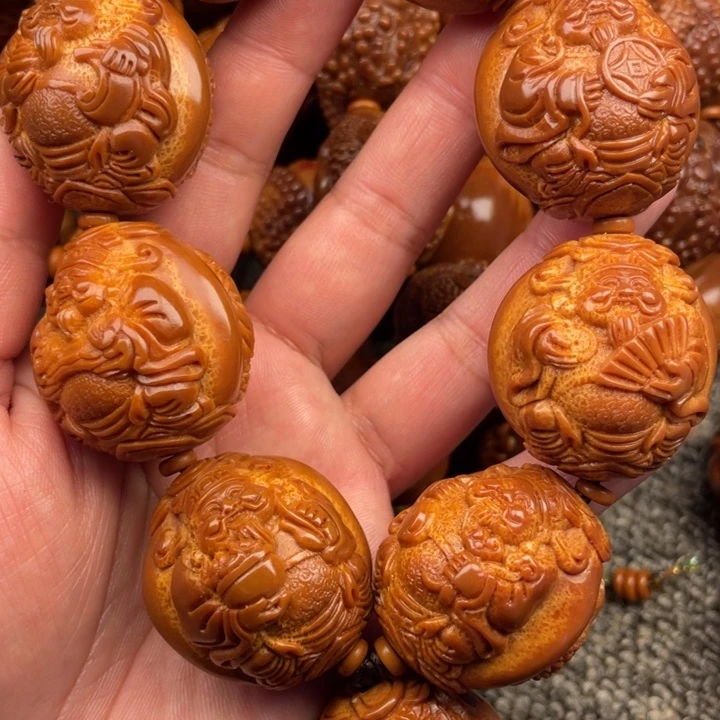 橄榄核吊坠刘*财橄榄核手持