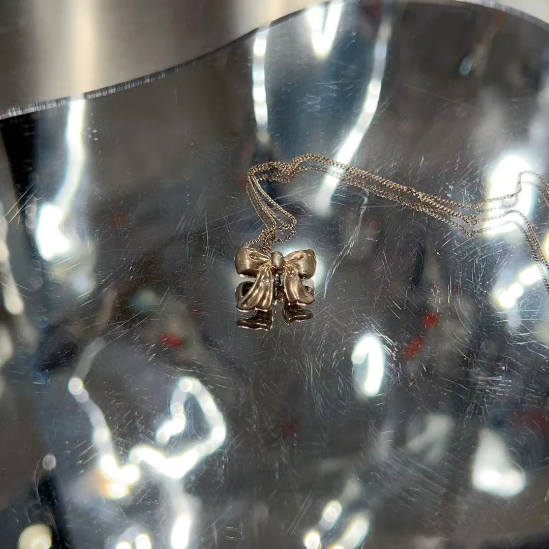 95新 Tiffany & Co./蒂芙尼 银色 蝴蝶结 项链/0061