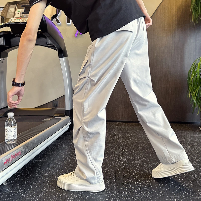 冰丝速干休闲裤男夏季薄款斜切伞兵裤美式潮牌褶皱宽松直筒工装裤