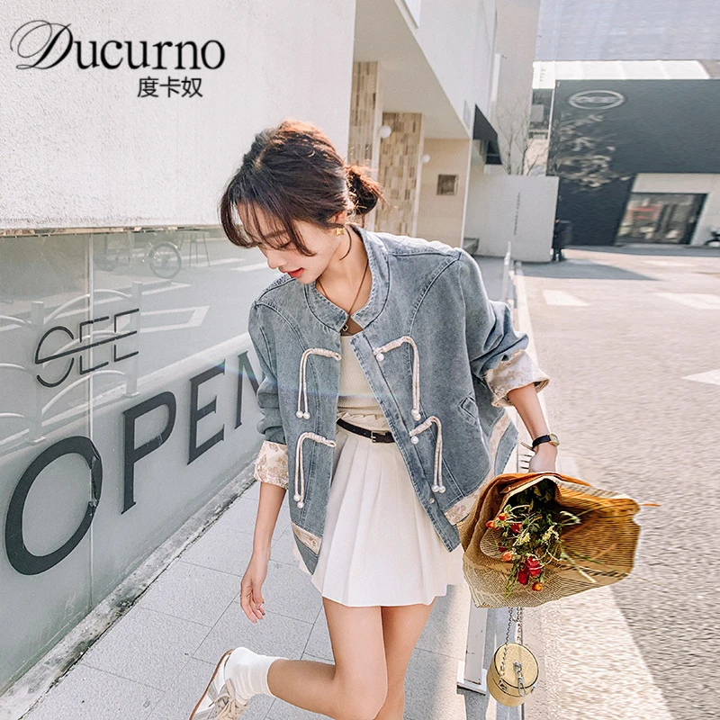 新中式复古盘扣牛仔外套女2025年秋季新款别致拼接设计感短款上衣