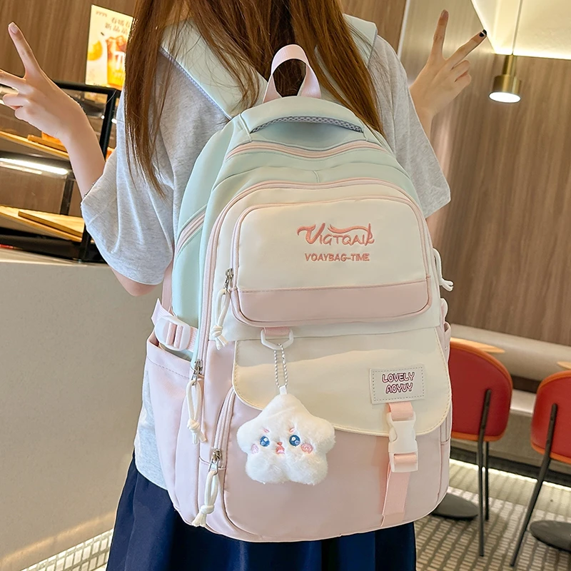 高颜值书包女初中生拼色可爱大容量小学生双肩包大学生设计感背包