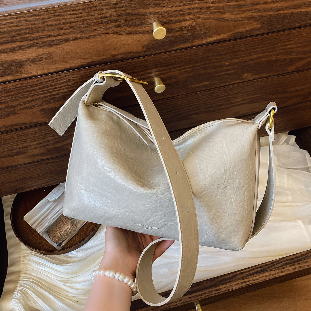 简约大容量包包女2025新款时尚百搭休闲单肩包学生通勤斜挎托特包