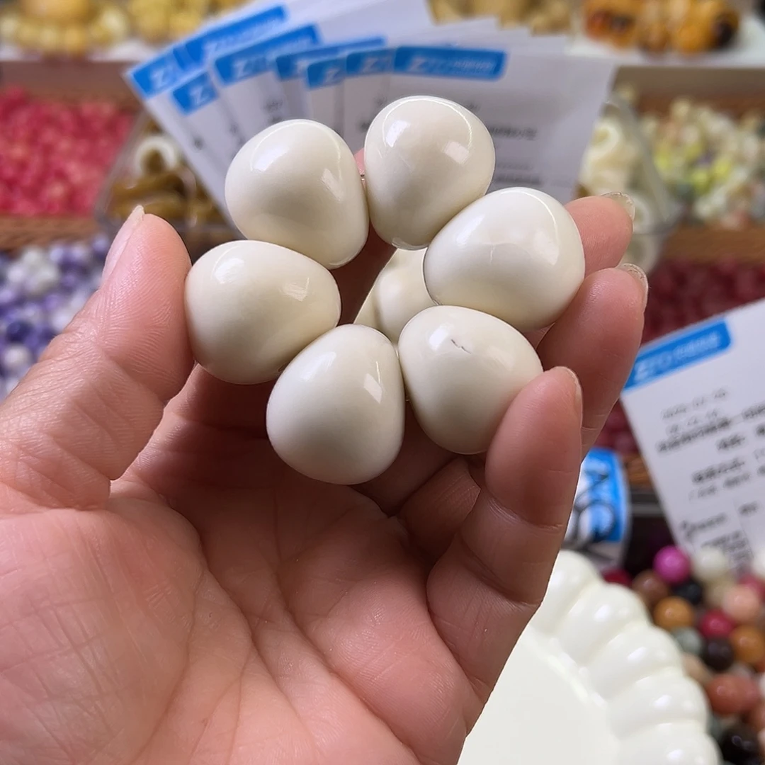 菩提根/象牙果手串瑕疵卡26白色蒜瓣一串表面有坏