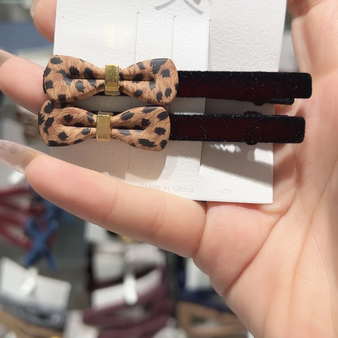 非金属仿珍珠豹纹蝴蝶结一字鸭夹