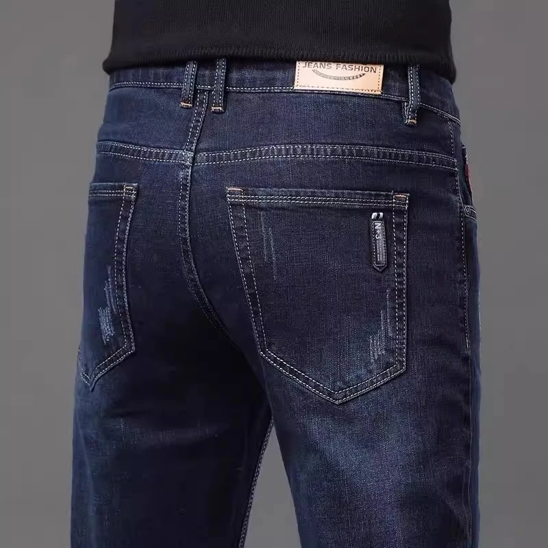 香港高端蓝黑加绒牛仔裤男款2025新款秋冬季修身直筒弹力休闲长裤