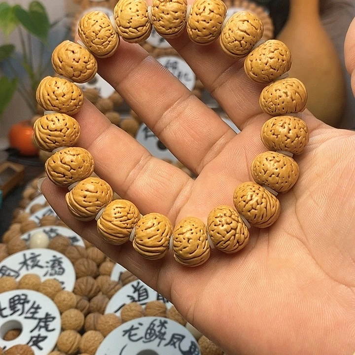 【闪购商品】a****d桃核手串纽扣手串