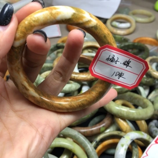 未镶嵌蛇纹石玉手镯橘**梅