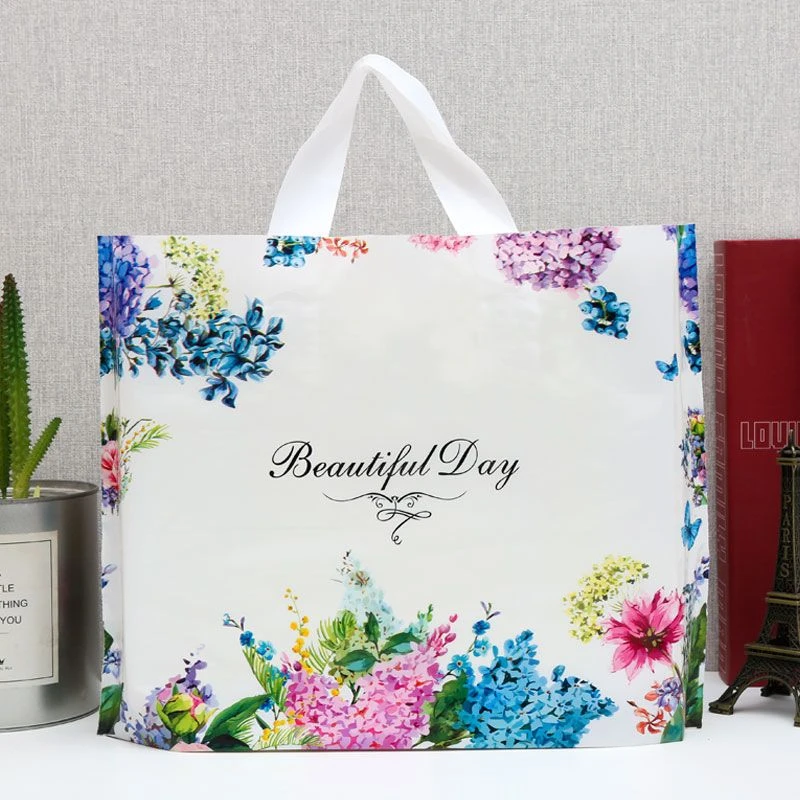 服装袋子手提塑料袋男女童装美容化妆品饰品店包装购物袋定做批发