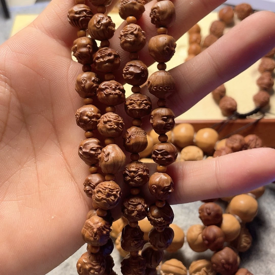 龙纹桃核雕刻罗汉脖挂（色差）