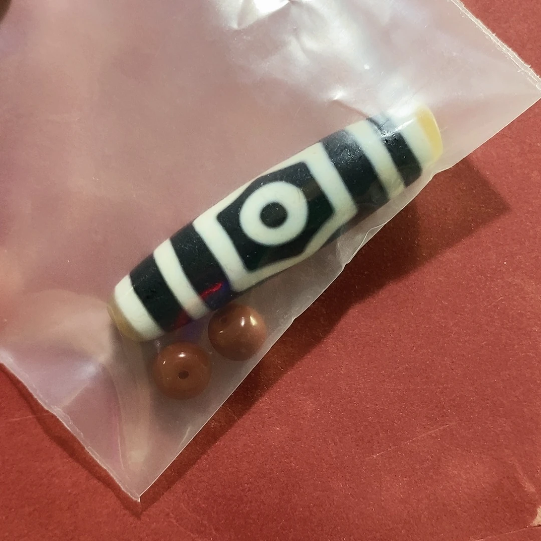 刘***生玛瑙/玉髓未镶嵌颈饰行运顶料三眼