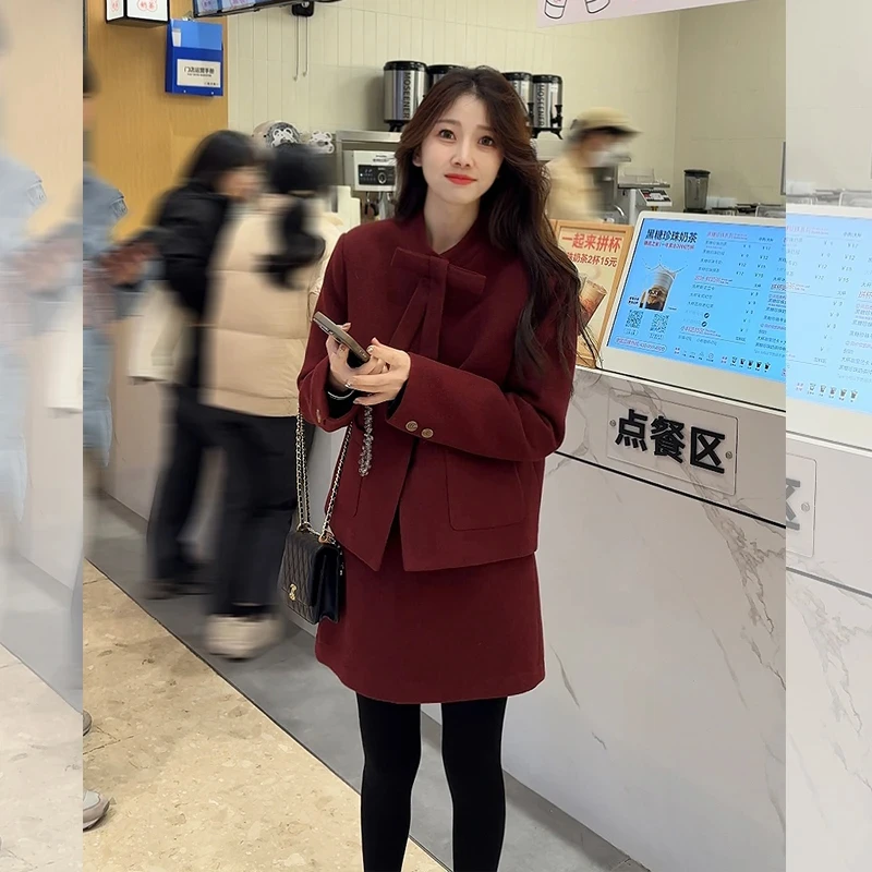 圣诞节氛围感蝴蝶结加棉毛呢外套女冬季新款半身裙时尚套装两件套