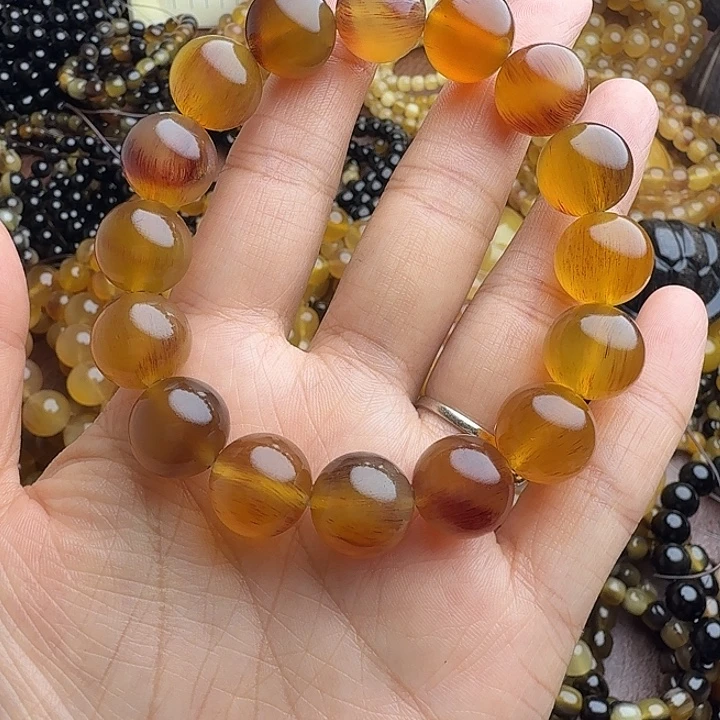 小***奶木质类驴蹄子1.4蜜色爆血手串