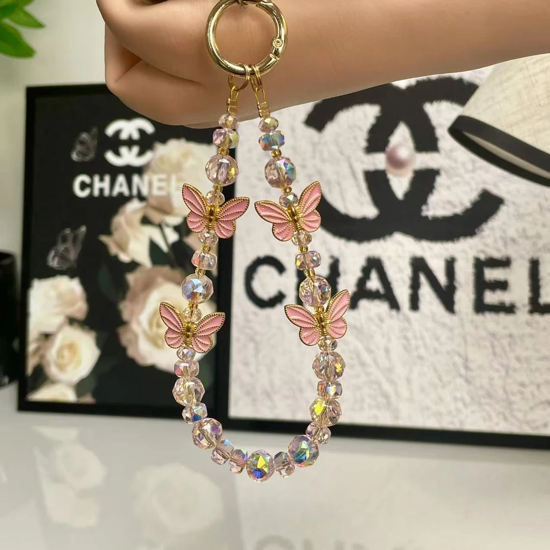 158手工合金蝴蝶琉璃水晶防丢手机挂链精致百搭时尚挂绳