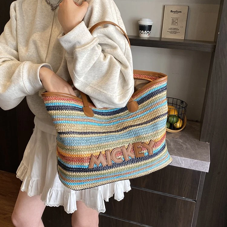 彩虹编织托特包包女2025新款时尚大容量单肩包轻奢海边沙滩草编包