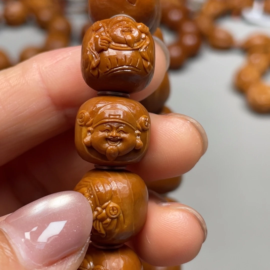 橄榄核吊坠M****s劳形财神